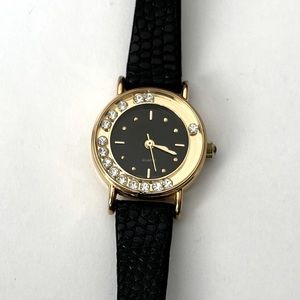 Vintage Avon black and gold tone watch with crystals